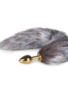 Kleine goudkleurige buttplug met bruin/witte vossenstaart